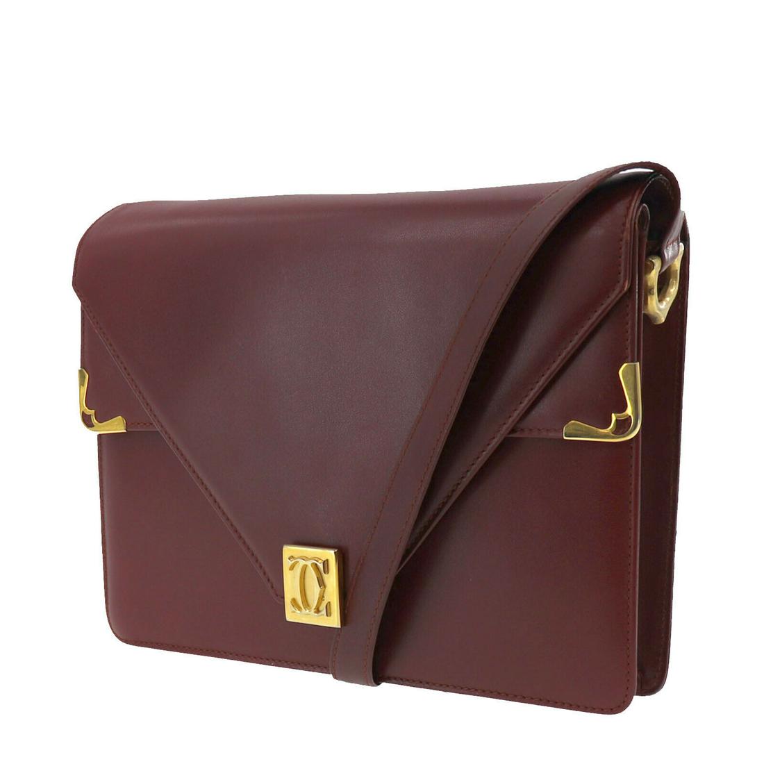 Authentic CARTIER Shoulder Bag: Brand: CARTIER Model: Shoulder Bag Country of Origin: Material: Leather Color: Bordeaux Size (inch): medium All Bidhaus items come with a 100 % money-back authenticity guarantee. ALL SALES ARE FINAL. 