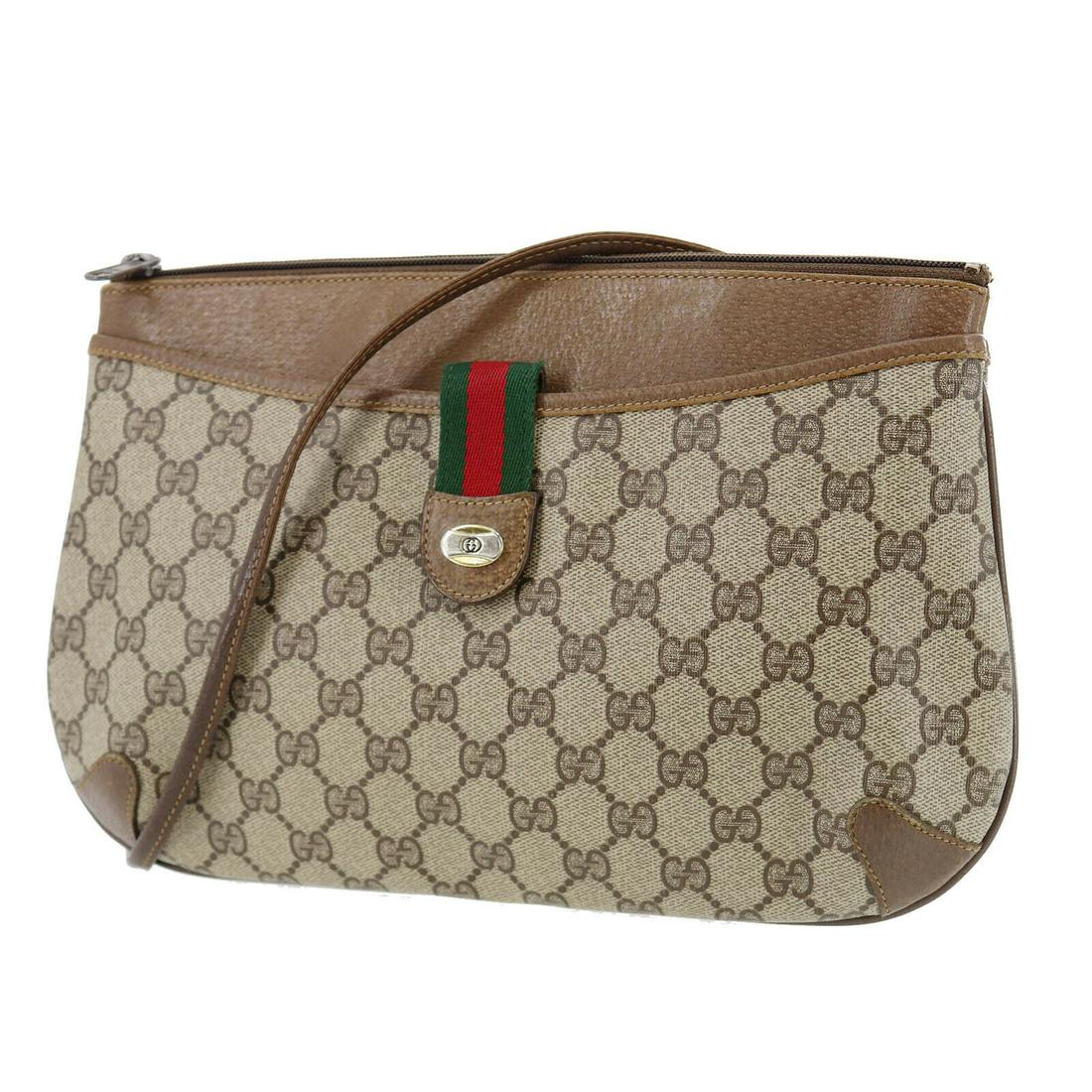 Authentic GUCCI Shoulder Bag: Brand: GUCCI Model: Shoulder Bag Country of Origin: Italy Material: Leather Color: Gold Bag Length: 12.2 Bag Height: 8.2 Bag Depth: 0.9 All Bidhaus items come with a 100 % money-back authenticity guar