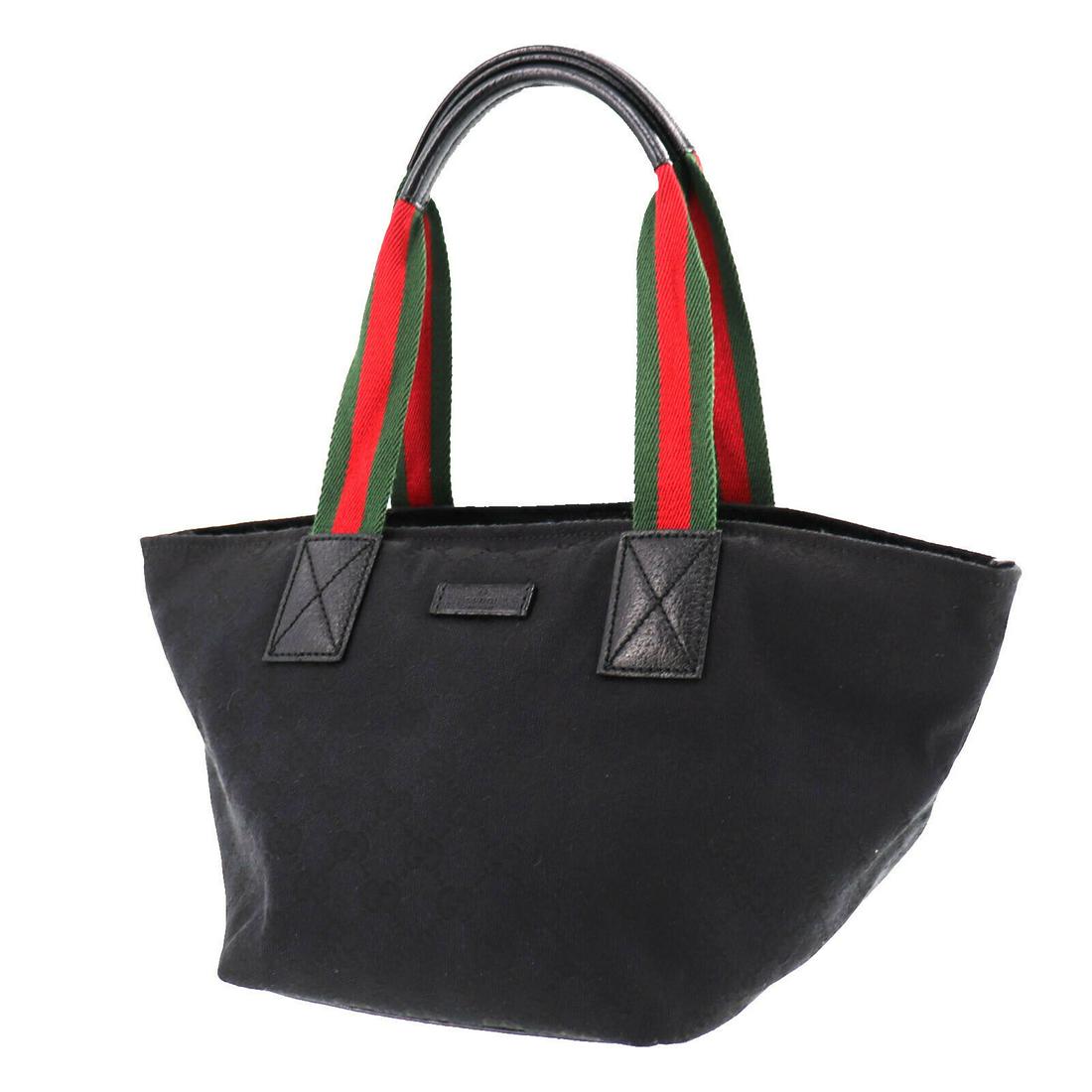 Authentic GUCCI Tote Bag: Brand: GUCCI Model: Tote Bag Country of Origin: Italy Material: Canvas Color: Black Bag Length: 14.5 Bag Height: 7.8 Bag Depth: 7.0 All Bidhaus items come with a 100 % money-back authenticity guarante