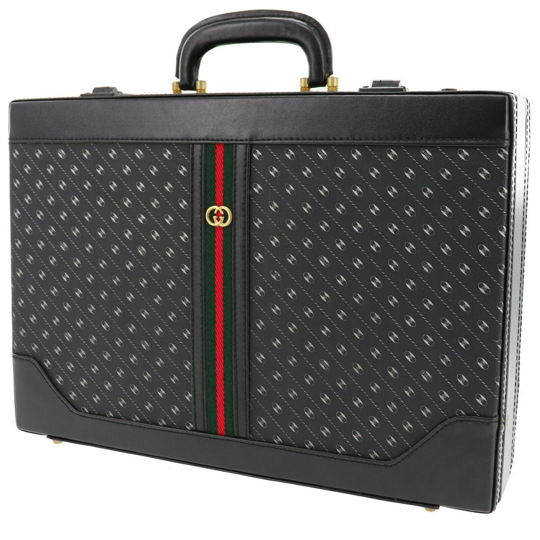 Authentic GUCCI Trunk Case: Brand: GUCCI Model: Trunk Case Country of Origin: Italy Material: Leather Color: Black Bag Length: 17.7 Bag Height: 12.5 Bag Depth: 3.9 All Bidhaus items come with a 100 % money-back authenticity guar