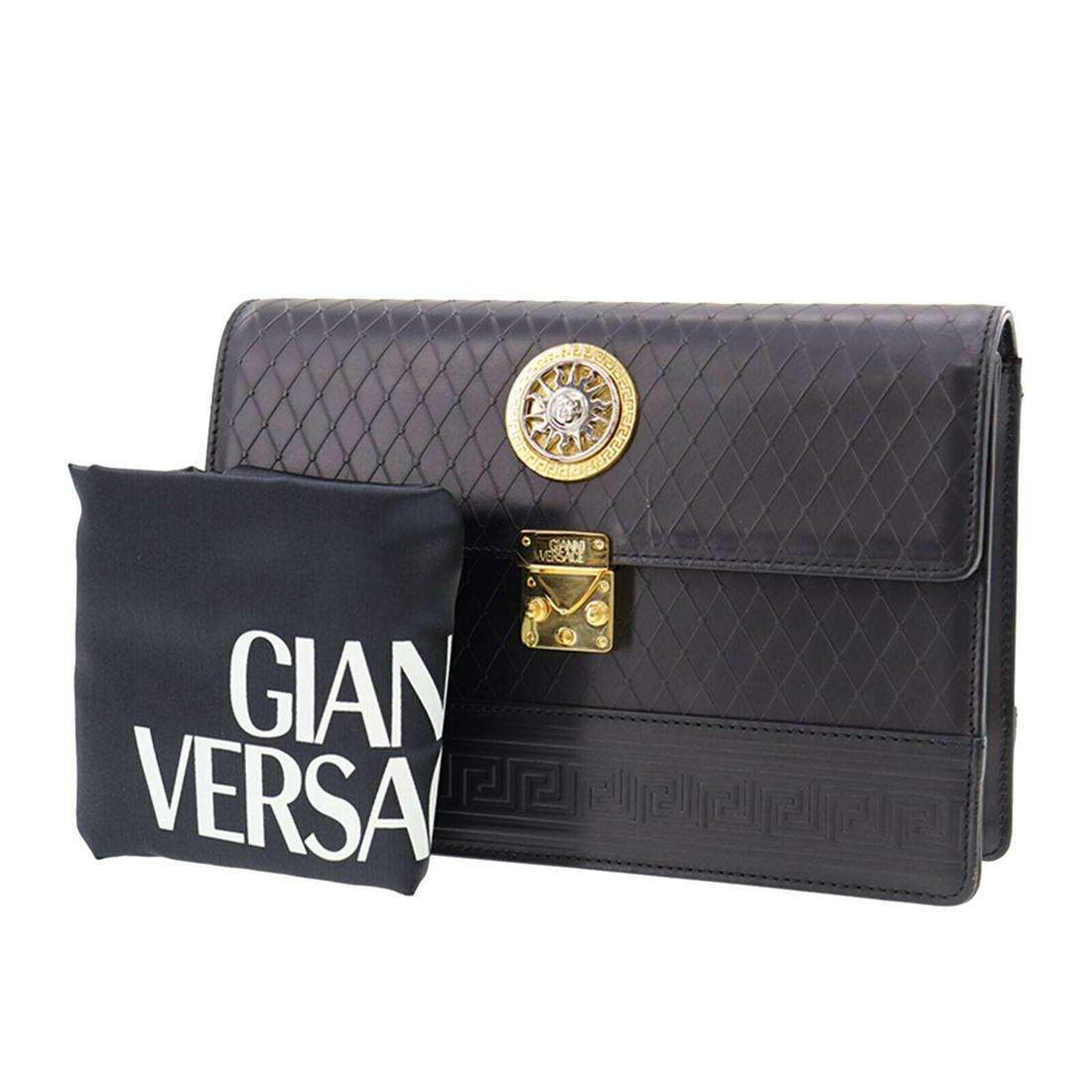 Authentic GIANNI VERSACE Clutch: Brand: GIANNI VERSACE Model: Clutch Country of Origin: Unknown Material: Canvas Color: Black Bag Length: 9.8 Bag Height: 7.0 Bag Depth: 2.3 All Bidhaus items come with a 100 % money-back authenticity