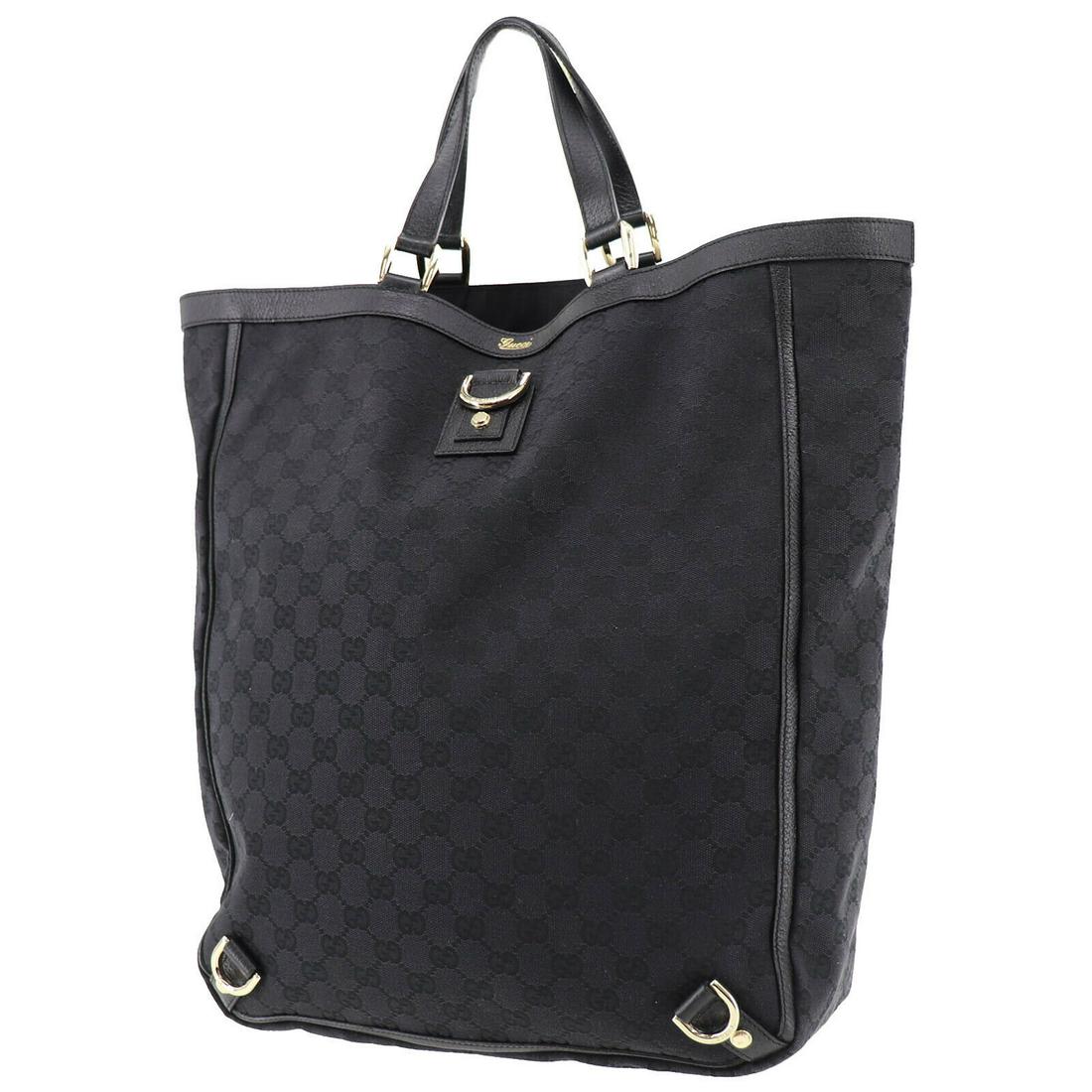 Authentic GUCCI Tote Bag: Brand: GUCCI Model: Tote Bag Country of Origin: Italy Material: Canvas Color: Gold Bag Length: 12.9 Bag Height: 15.7 Bag Depth: 4.7 All Bidhaus items come with a 100 % money-back authenticity guarante