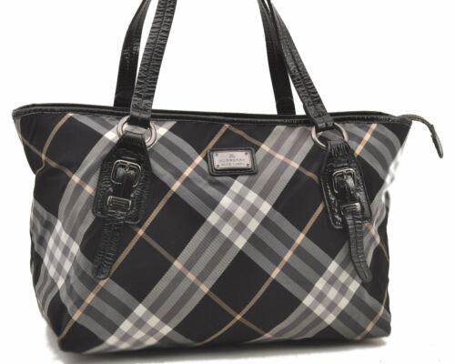 Authentic BURBERRY Tote Bag: Brand: BURBERRY Model: Tote Bag Country of Origin: Japan Material: Nylon Color: Black Bag Length: 14.2inches (36cm) Bag Height: 9.8inches (25cm) Bag Depth: 7.3inches (18.5cm) All Bidhaus items come wi