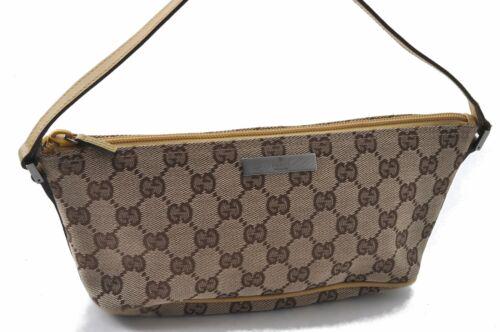 Authentic GUCCI Hand Bag: Brand: GUCCI Model: Hand Bag Country of Origin: Italy Material: Canvas Color: Brown Bag Length: 8.5inches (21.5cm) Bag Height: 3.7inches (9.5cm) Bag Depth: 4.1inches (10.5cm) All Bidhaus items come wi