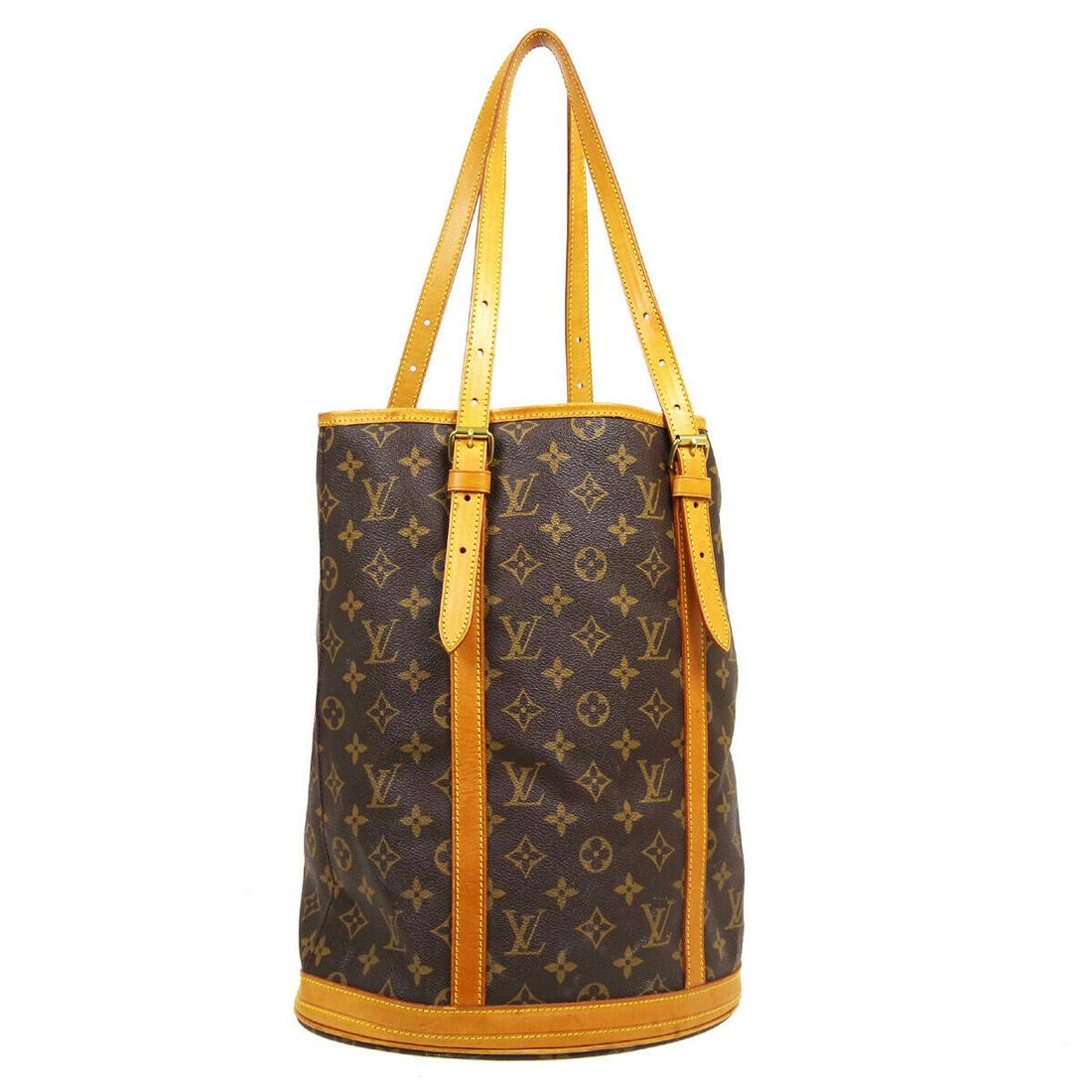 Authentic LOUIS VUITTON Bucket Gm Tote: Brand: LOUIS VUITTON Model: Bucket Gm Tote Country of Origin: France Material: Leather Color: Brown Size (Inch): W 10.6 x H 14.2 x D 8.1 "Shoulder Drop. 6.3 - 12.2 " Size (CM): W 27.0 x H 36.0 x D 20.