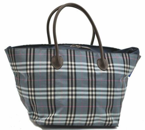 Authentic BURBERRY Hand Bag: Brand: BURBERRY Model: Hand Bag Country of Origin: Japan Material: Nylon Color: Light Blue Bag Length: 9.1inches (23cm) Bag Height: 9.3inches (23.5cm) Bag Depth: 9.1inches (23cm) All Bidhaus items com