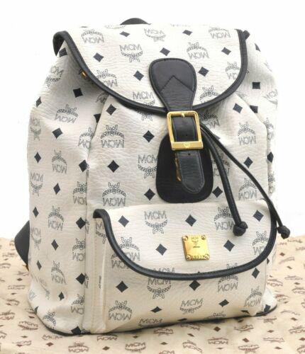 Authentic MCM Backpack: Brand: MCM Model: Backpack Country of Origin: Germany Material: Leather Color: Black Bag Length: 10.6inches (27cm) Bag Height: 12.6inches (32cm) Bag Depth: 5.9inches (15cm) All Bidhaus items come with