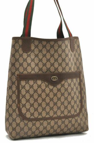 Authentic GUCCI Tote Bag: Brand: GUCCI Model: Tote Bag Country of Origin: Italy Material: PVC Color: Brown Bag Length: 12.2inches (31cm) Bag Height: 14.6inches (37cm) Bag Depth: 3.1inches (8cm) All Bidhaus items come with a 10