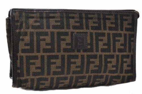 Authentic FENDI Clutch Bag: Brand: FENDI Model: Clutch Bag Country of Origin: Italy Material: Canvas Color: Brown Bag Length: 10.2inches(26cm) Bag Height: 5.9inches(15cm) Bag Depth: 3.1inches(8cm) All Bidhaus items come with a 1