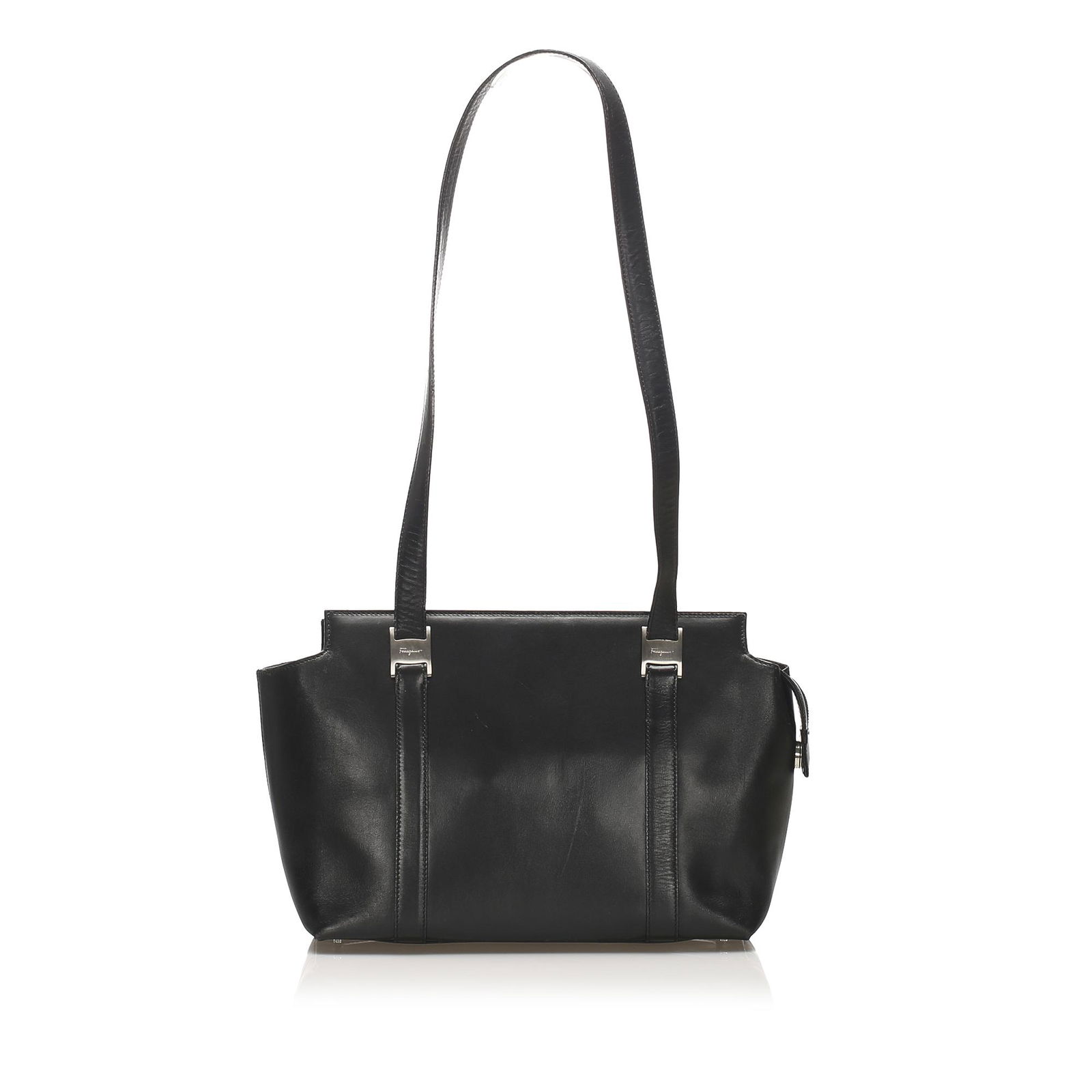 Authentic Ferragamo Leather Tote Bag: This tote bag features a leather body flat leather straps and a top zip closure. Brand: Ferragamo Model: Leather Tote Bag Origin: Italy Category: Tote Bag Color: Black Style: Others Material: Leather