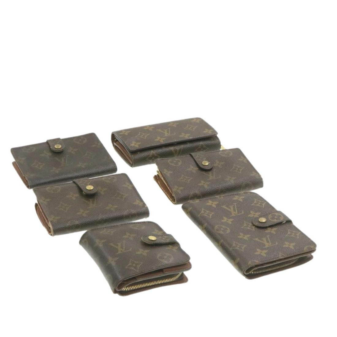 Authentic LOUIS VUITTON Monogram Canvas Wallet: Brand: LOUIS VUITTON Material: Monogram Canvas Style: Wallet Color: Monogram Size(inch): - Country of Origin: - Accessory: There is no item box and dust bag. We will send only the item which is put in