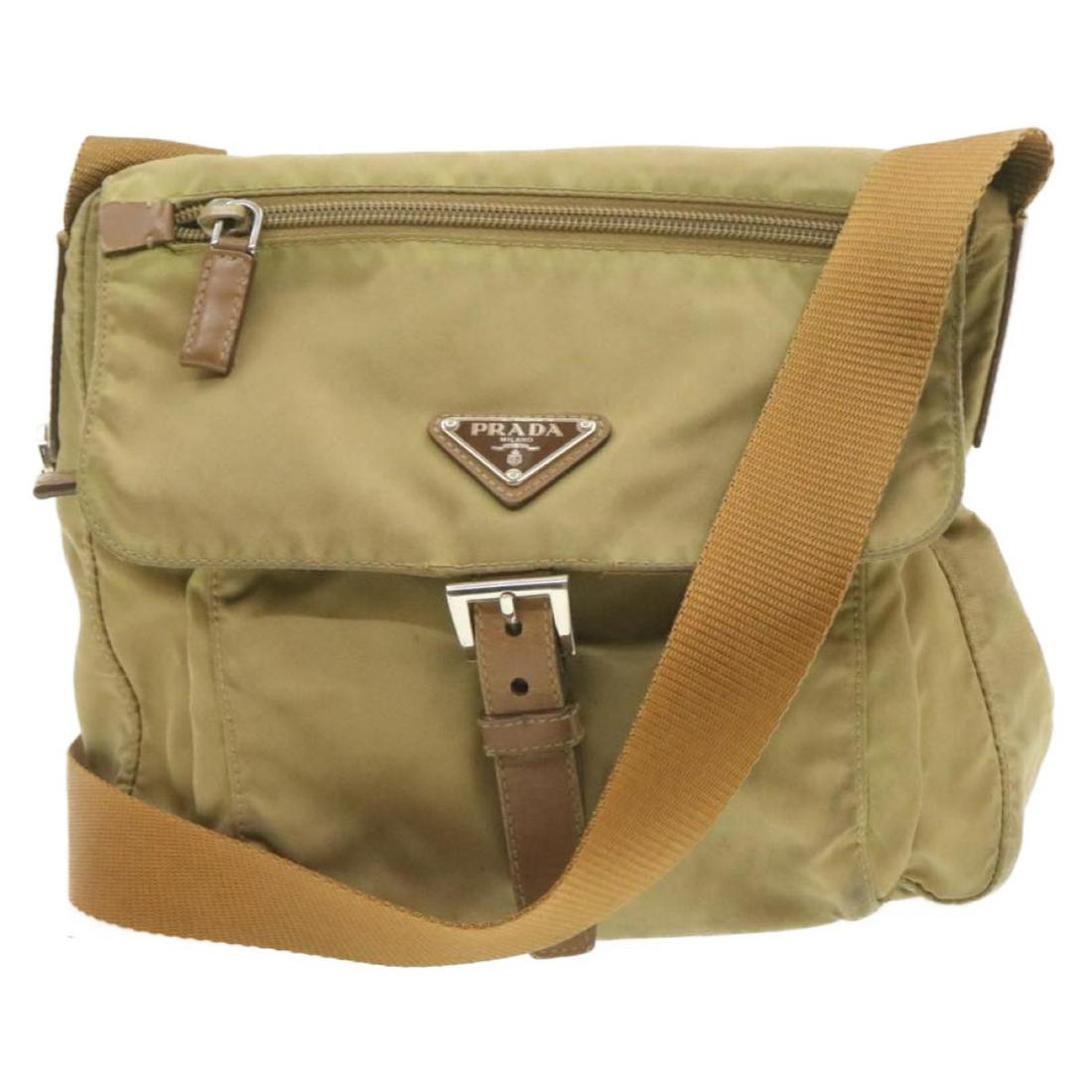 Authentic PRADA Nylon Shoulder Bag: Brand: PRADA Material: Nylon Style: Shoulder Bag Color: Khaki Size(inch): W9.44 x H9.44 x D3.93inch / Shoulder Drop 12.59-23.62inch(Approx) Country of Origin: Italy Accessory: There is no item box and