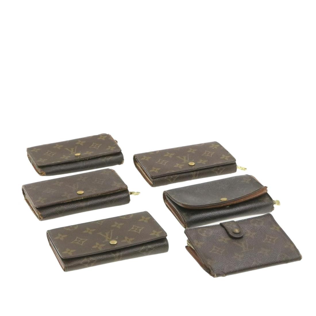 Authentic LOUIS VUITTON Monogram Canvas Wallet: Brand: LOUIS VUITTON Material: Monogram Canvas Style: Wallet Color: Monogram Size(inch): - Country of Origin: - Accessory: There is no item box and dust bag. We will send only the item which is put in