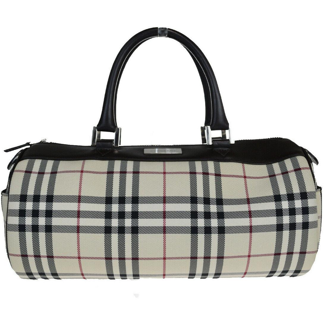 Authentic BURBERRY Hand Bag: Brand: BURBERRY Model: Hand Bag Country of Origin: Material: Nylon Leather Color: brown Beige Size (Inch): W12.2X H5.9X D5.9"Size (CM): W31X H15X D15Cm All Bidhaus items come with a 100 % money-back a