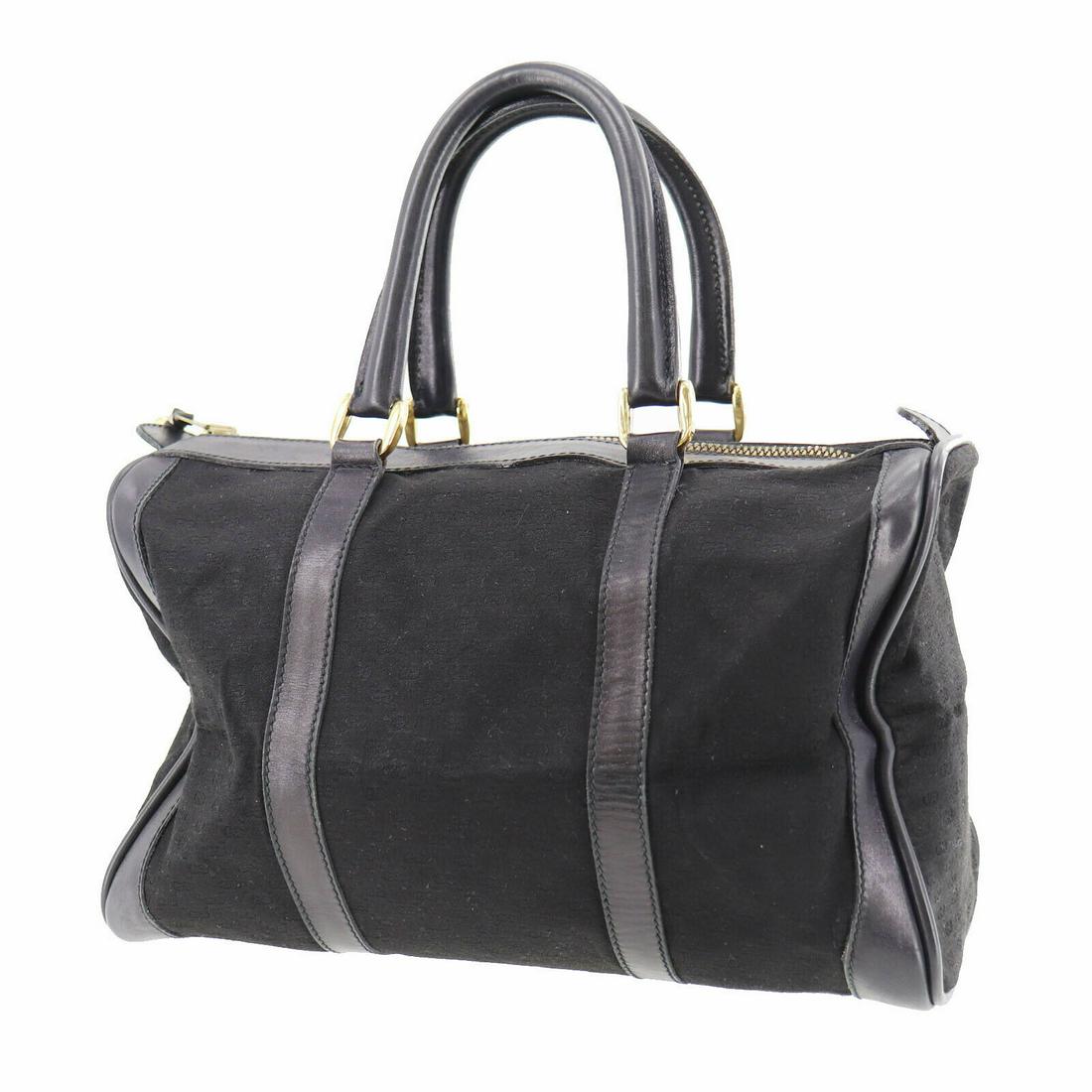 Authentic GUCCI Hand Bag: Brand: GUCCI Model: Hand Bag Country of Origin: Italy Material: Canvas Color: Gold Size (inch): medium All Bidhaus items come with a 100 % money-back authenticity guarantee. ALL SALES ARE FINAL. Pleas