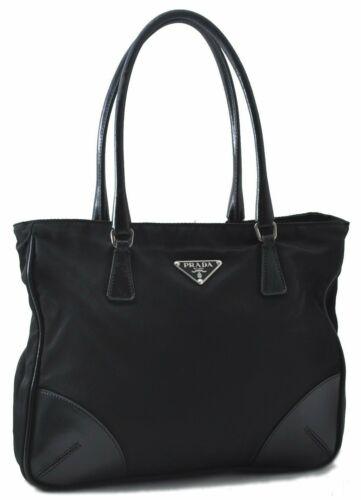 Authentic PRADA Tote Bag: Brand: PRADA Model: Tote Bag Country of Origin: Italy Material: Nylon Color: Black Bag Length: 10.2inches (26cm) Bag Height: 8.5inches (21.5cm) Bag Depth: 2inches (5cm) All Bidhaus items come with a 1