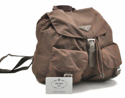 Authentic PRADA Backpack: Brand: PRADA Model: Backpack Country of Origin: Italy Material: Nylon Color: Khaki Bag Length: 11.8inches (30cm) Bag Height: 11inches (28cm) Bag Depth: 6.1inches (15.5cm) All Bidhaus items come with a