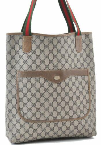 Authentic GUCCI Tote Bag: Brand: GUCCI Model: Tote Bag Country of Origin: Italy Material: PVC Color: Brown Bag Length: 12inches (30.5cm) Bag Height: 14.2inches (36cm) Bag Depth: 3.1inches (8cm) All Bidhaus items come with a 10