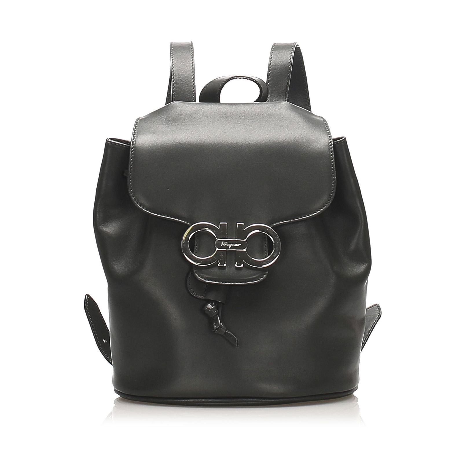 Authentic Ferragamo Gancini Leather Drawstring Backpack: This backpack features a leather body flat back straps a flat top handle a top flap with magnetic closure a drawstring closure and an interior slip pocket. Brand: Ferragamo Model: Gancini Leather Draw