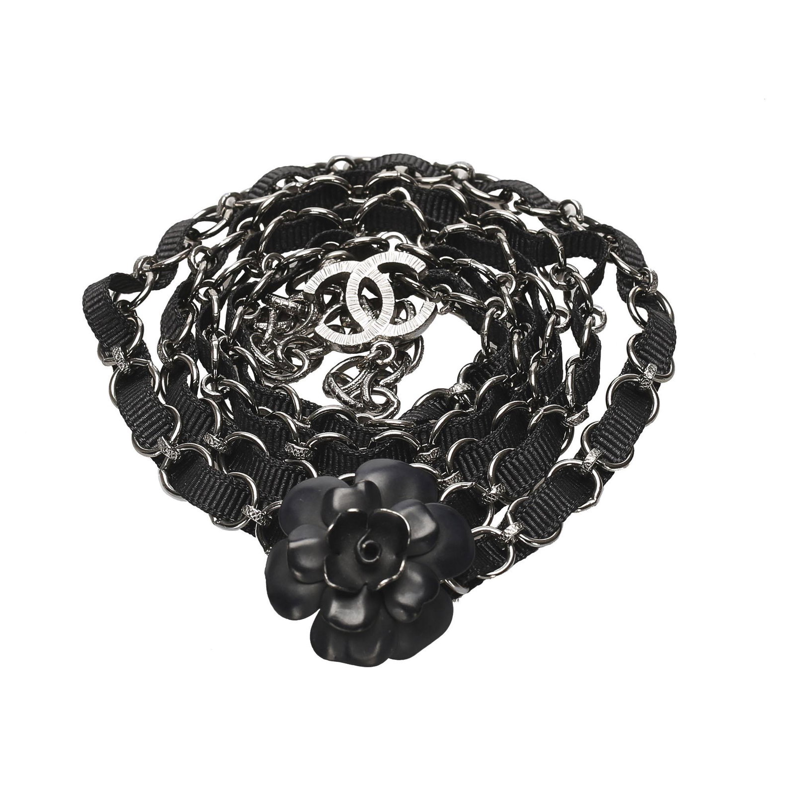 Authentic Chanel CC Camellia Chain Belt: This belt features a CC and camellia charm a fabric woven silver-tone chain and a hook closure. Brand: Chanel Model: CC Camellia Chain Belt Origin: France Category: Belt Color: Black x Silver Style: C