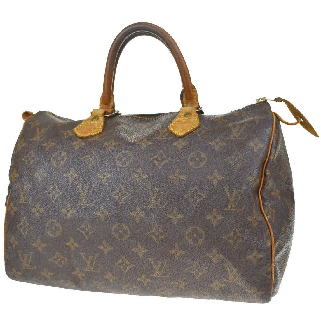 Authentic LOUIS VUITTON Hand Bag: Brand: LOUIS VUITTON Model: Hand Bag Country of Origin: France Material: Monogram Leather Color: Brown Size (Inch): W 11.8 X H 8.3 X D 6.7 "Size (CM): W 30 X H 21 X D 17 Cm All Bidhaus items come with