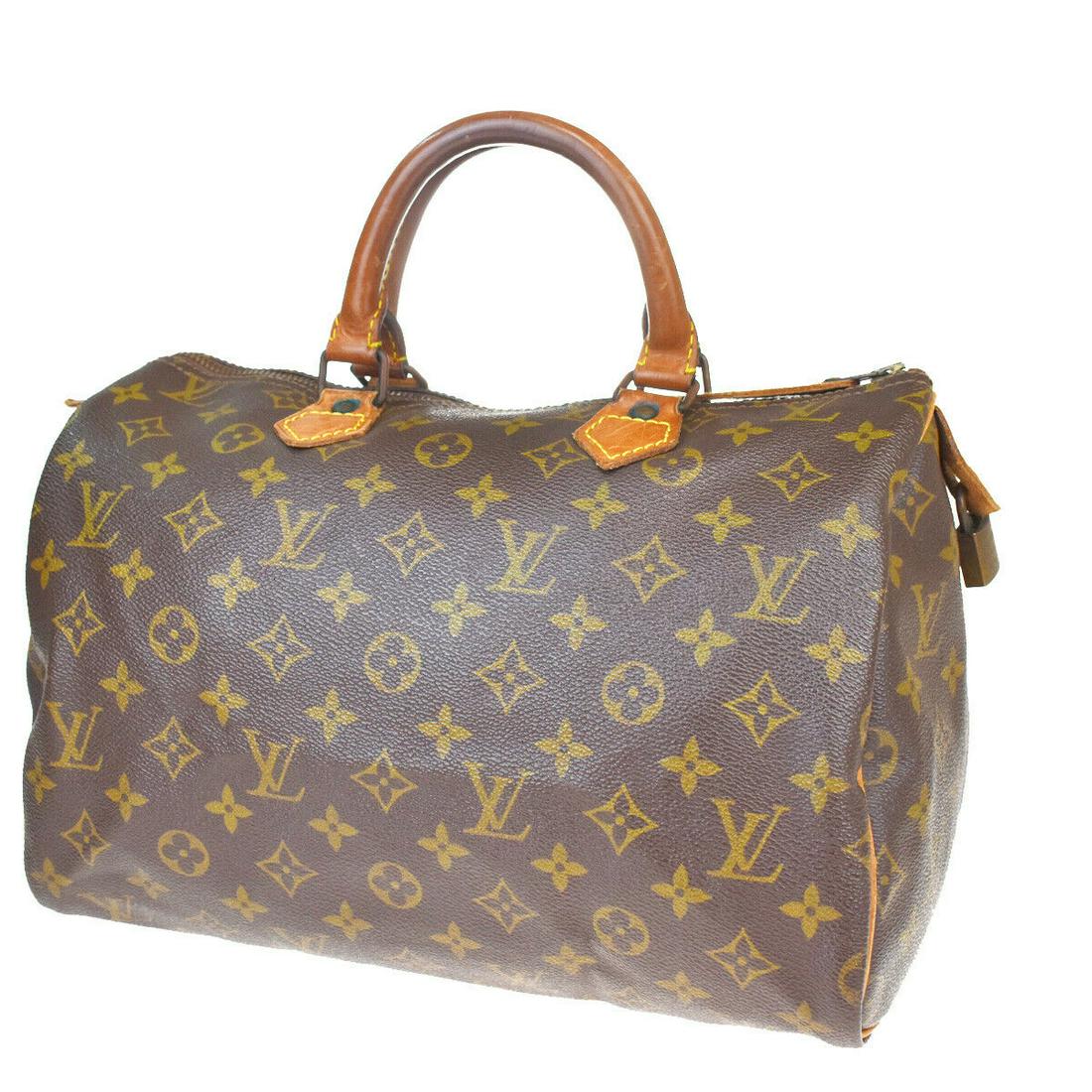 Authentic LOUIS VUITTON Hand Bag: Brand: LOUIS VUITTON Model: Hand Bag Country of Origin: France Material: Monogram Leather Color: Brown Size (Inch): W 11.8 X H 8.3 X D 6.7 "Size (CM): W 30 X H 21 X D 17 Cm All Bidhaus items come with