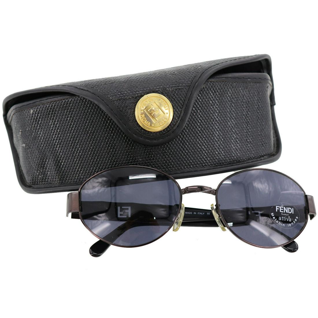 Authentic FENDI Oval: Brand: FENDI Model: Oval Country of Origin: Italy Material: Metal Color: Black All Bidhaus items come with a 100 % money-back authenticity guarantee. ALL SALES ARE FINAL. Please refer to images carefu
