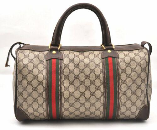 Authentic GUCCI Hand Bag: Brand: GUCCI Model: Hand Bag Country of Origin: Italy Material: PVC Color: Brown Bag Length: 15.6inches (39.5cm) Bag Height: 8.5inches (21.5cm) Bag Depth: 5.9inches (15cm) All Bidhaus items come with 