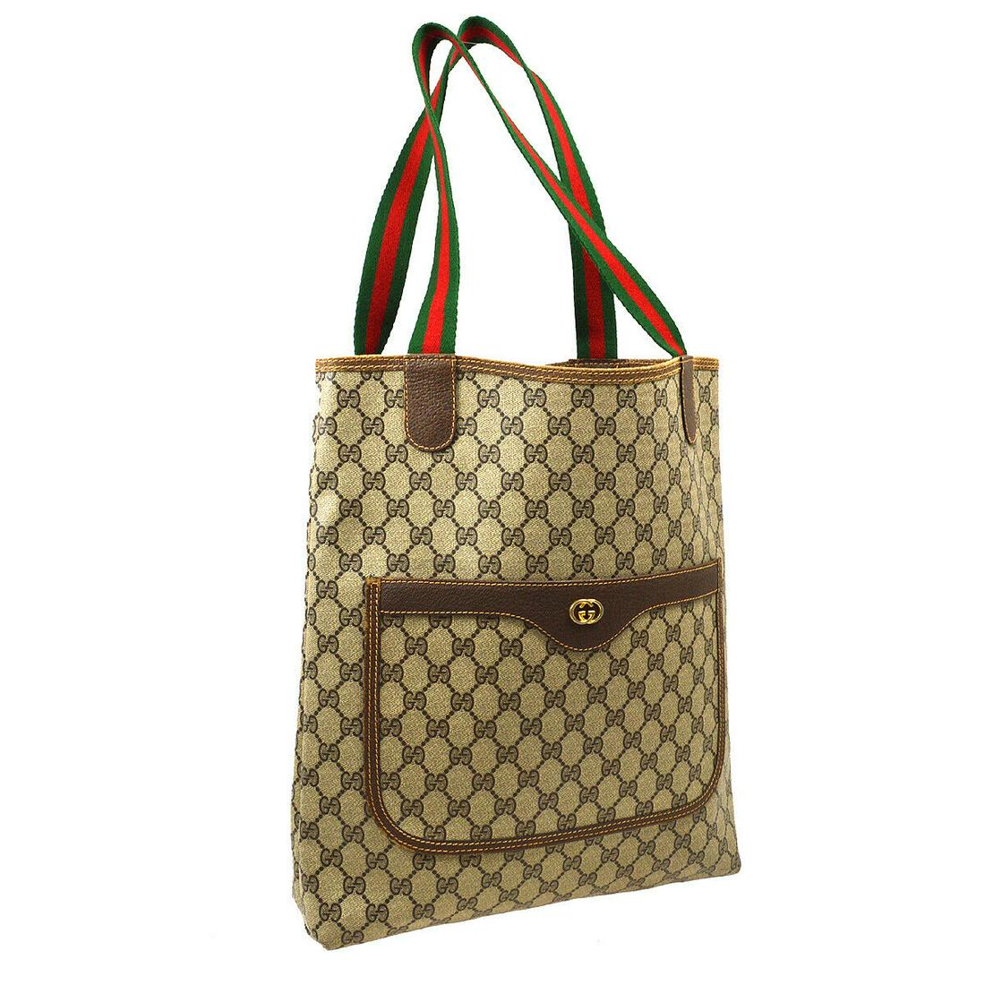 Authentic GUCCI Shoulder Tote Bag: Brand: GUCCI Model: Shoulder Tote Bag Country of Origin: Italy Material: Canvas Color: Brown Green Red Size (Inch): W 12.2 x H 14.2 x D 3.9 " Strap Drop. 11.0 " Size (CM): W 31.0 x H 36.0 x D 10.0 cm 