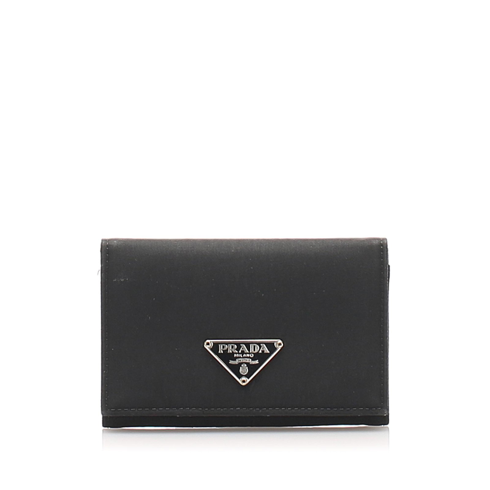 Authentic Prada Tessuto Card Holder: This card holder features a nylon body and slip compartments. Brand: Prada Model: Tessuto Card Holder Origin: Italy Category: Card Holder Color: Black Style: Tessuto Material: Fabric x Nylon Condition