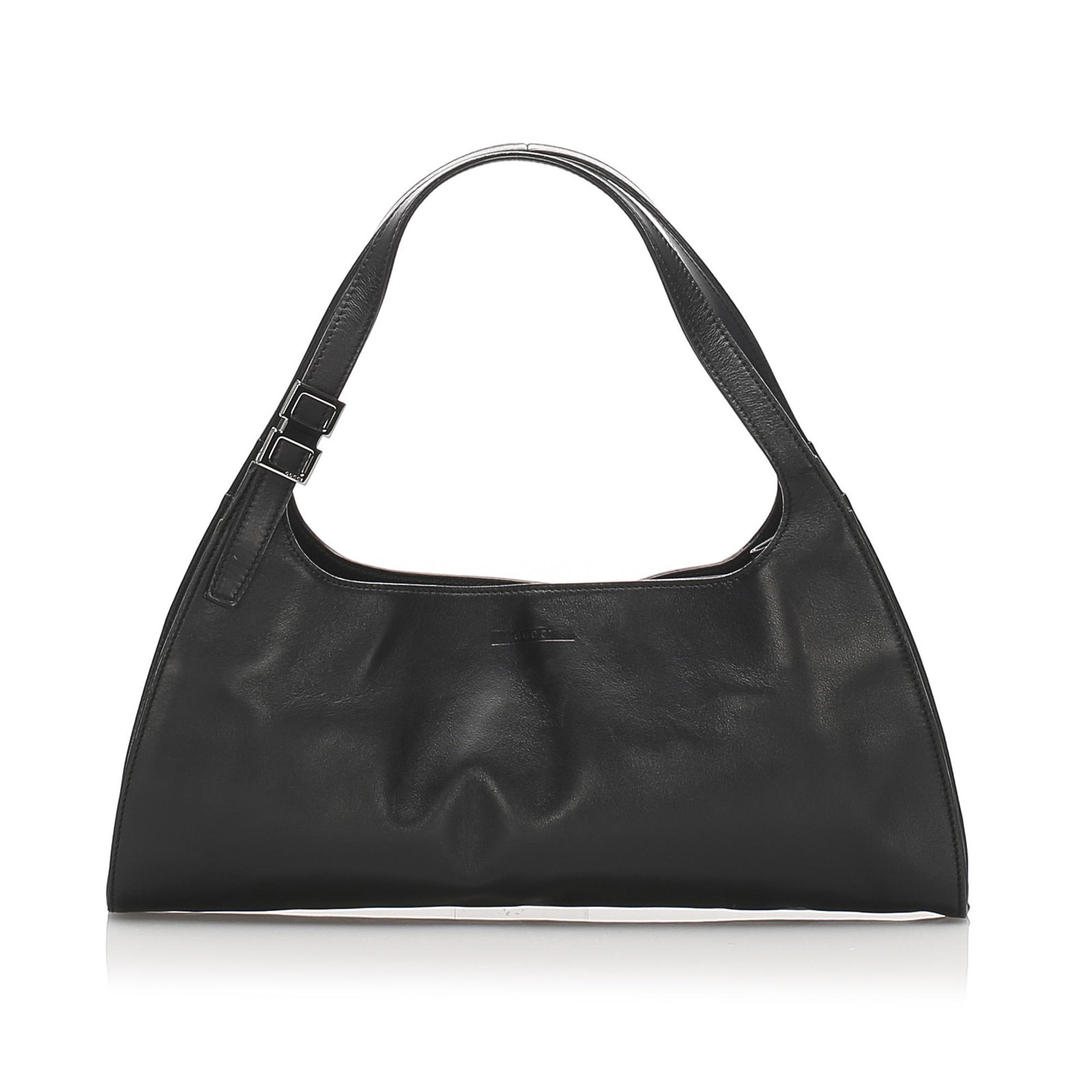 Authentic Gucci Leather Handbag: This handbag features a leather body flat handles an open top with magnetic snap button closure and an interior slip pocket. Brand: Gucci Model: Leather Handbag Origin: Italy Category: Handbag Color: 