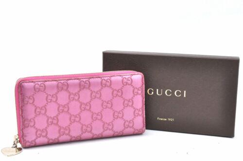Authentic GUCCI Wallet: Brand: GUCCI Model: Wallet Country of Origin: Italy Material: Leather Color: Pink Bag Length: 7.3inches(18.5cm) Bag Height: 3.7inches(9.5cm) Bag Depth: 0.8inches(2cm) All Bidhaus items come with a 100