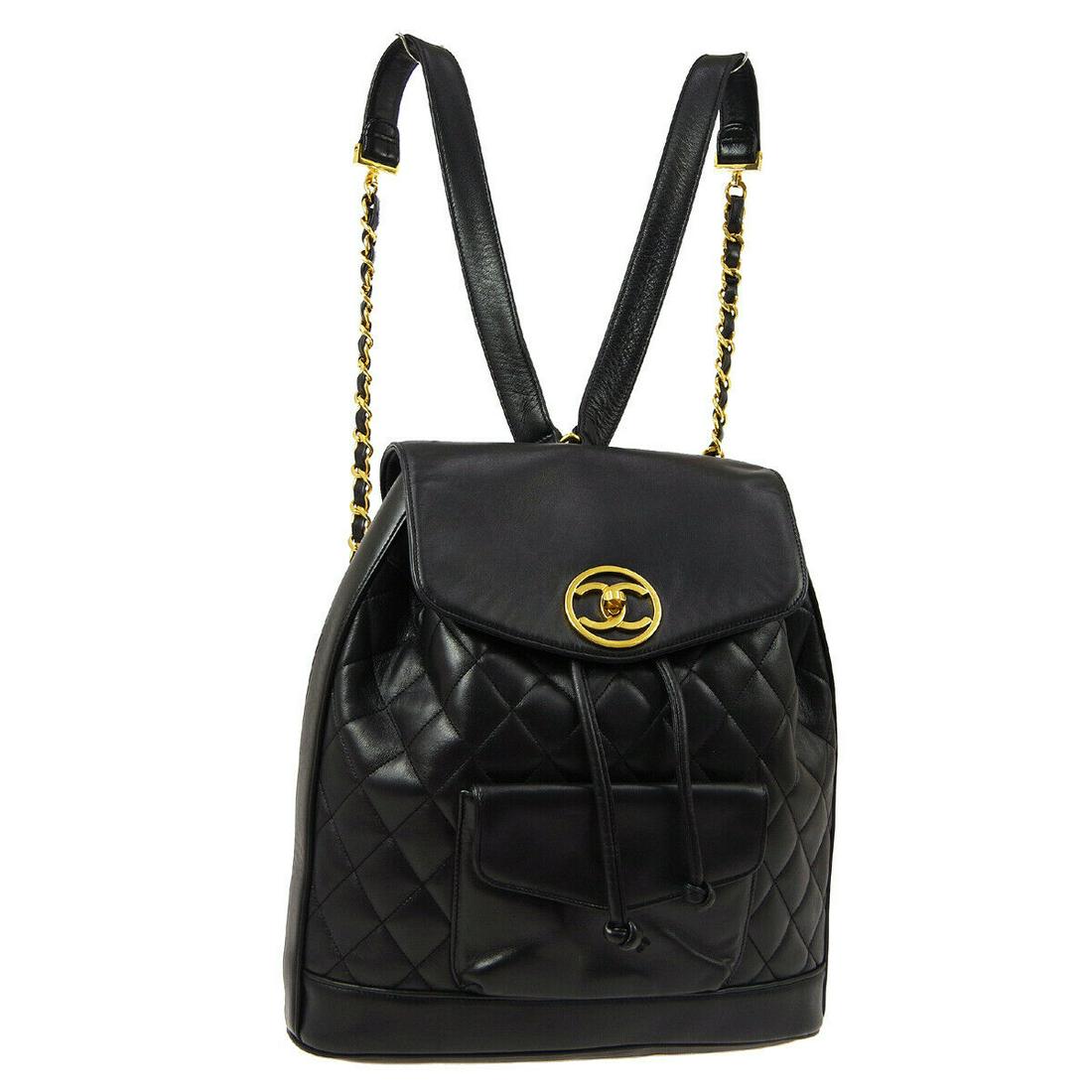 Authentic CHANEL Backpack Bag: Brand: CHANEL Model: Backpack Bag Country of Origin: Italy Material: Leather Color: Black Size (Inch): W 11.8 x H 11.8 x D 3.5 " Strap total length. 32.7 " Size (CM): W 30.0 x H 30.0 x D 9.0 cm Strap 