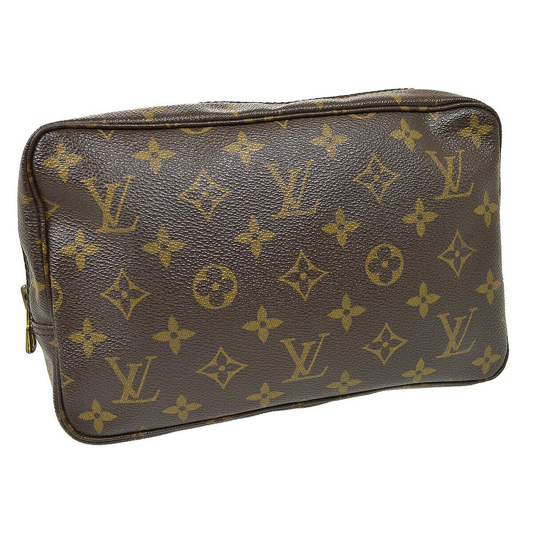 Authentic LOUIS VUITTON Monogram Cosmetic Bags: Brand: LOUIS VUITTON Model: Monogram Cosmetic Bags Country of Origin: France Material: PVC Color: Brown Size (Inch): W 9.1 x H 5.9 x D 2.6 " Size (CM): W 23.0 x H 15.0 x D 6.5 cm All Bidhaus items com