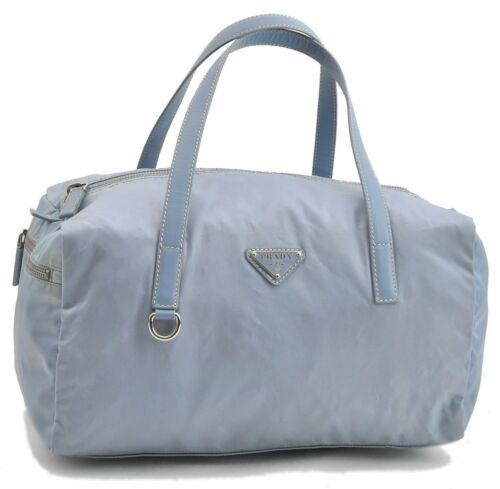 Authentic PRADA Hand Bag: Brand: PRADA Model: Hand Bag Country of Origin: Material: Nylon Color: Light Blue Bag Length: 12.6inches (32cm) Bag Height: 6.7inches (17cm) Bag Depth: 6.1inches (15.5cm) All Bidhaus items come with a