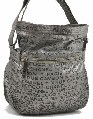 Authentic CHANEL Shoulder Bag: Brand: CHANEL Model: Shoulder Bag Country of Origin: Italy Material: Nylon Color: Gray Bag Length: 14inches (35.5cm) Bag Height: 15.4inches (39cm) Bag Depth: 5.7inches (14.5cm) All Bidhaus items come 
