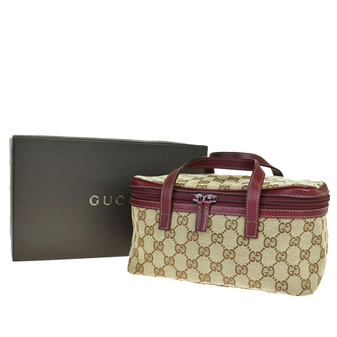 Authentic GUCCI Vanity Bag: Brand: GUCCI Model: Vanity Bag Country of Origin: Material: Leather Color: Brown Leather Size (Inch): W9.1X H4.7X D5.3"Size (CM): W23X H12X D13.5Cm All Bidhaus items come with a 100 % money-back authe