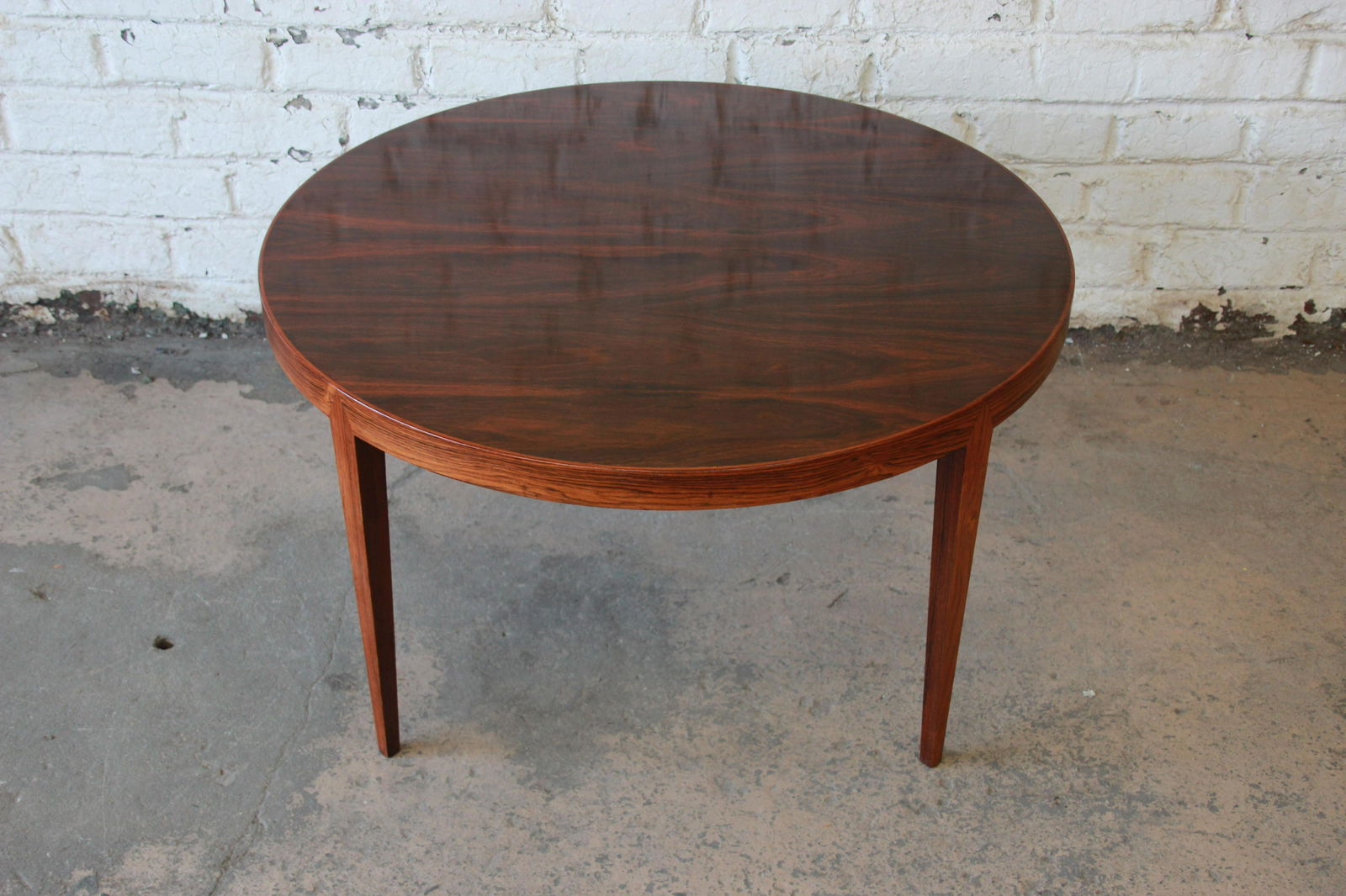 Severin Hansen for Haslev MÃ¸belsnedkeri Danish Modern: Offering a gorgeous Danish Modern rosewood coffee table designed by Severin Hansen for Haslev MÃ¸belsnedkeri circa 1950s. The table features stunning rosewood grain and sleek Danish design. There ar