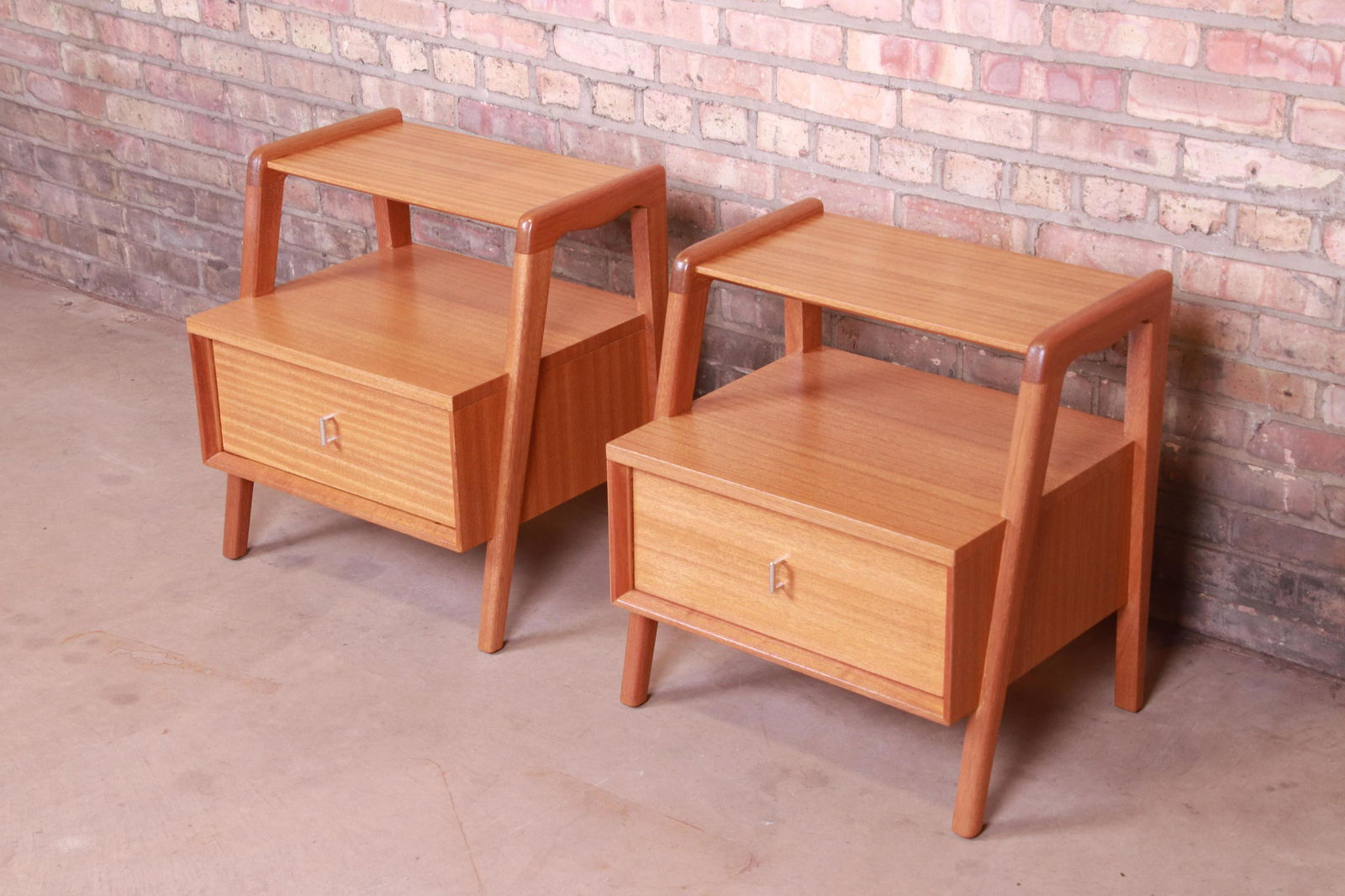 Paul Laszlo for Brown Saltman Mid-Century Modern: An exceptional pair of mid-century modern nightstands By Paul Laszlo for Brown Saltman USA 1950s Bleached mahogany with original hardware. Measures: 21.13"W x 17"D x 23"H. Newly refinished. Excellent