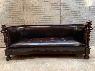 Antique Art Nouveau Karpen Carved Figural Female Ended: Antique Art Nouveau Carved Figural Female Ended Flame Mahogany Curved Leather Karpen Sofa Newly Upholstered Antique Art Nouveau Curved Leather Parlor Sofa by Karpen features Flame Mahogany constructio