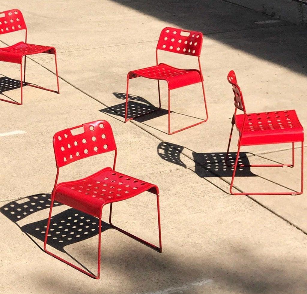 Mid Century Modern Red Omstak Chairs by Rodney Kinsman: Mid Century Modern Red Omstak Chairs by Rodney Kinsman for Biefeplast - Set of 10 Circa 1972 We can split the set. H 29.5 W 19 D 19 Seat H 18 Good vintage conditionguarantee that the item is as descri