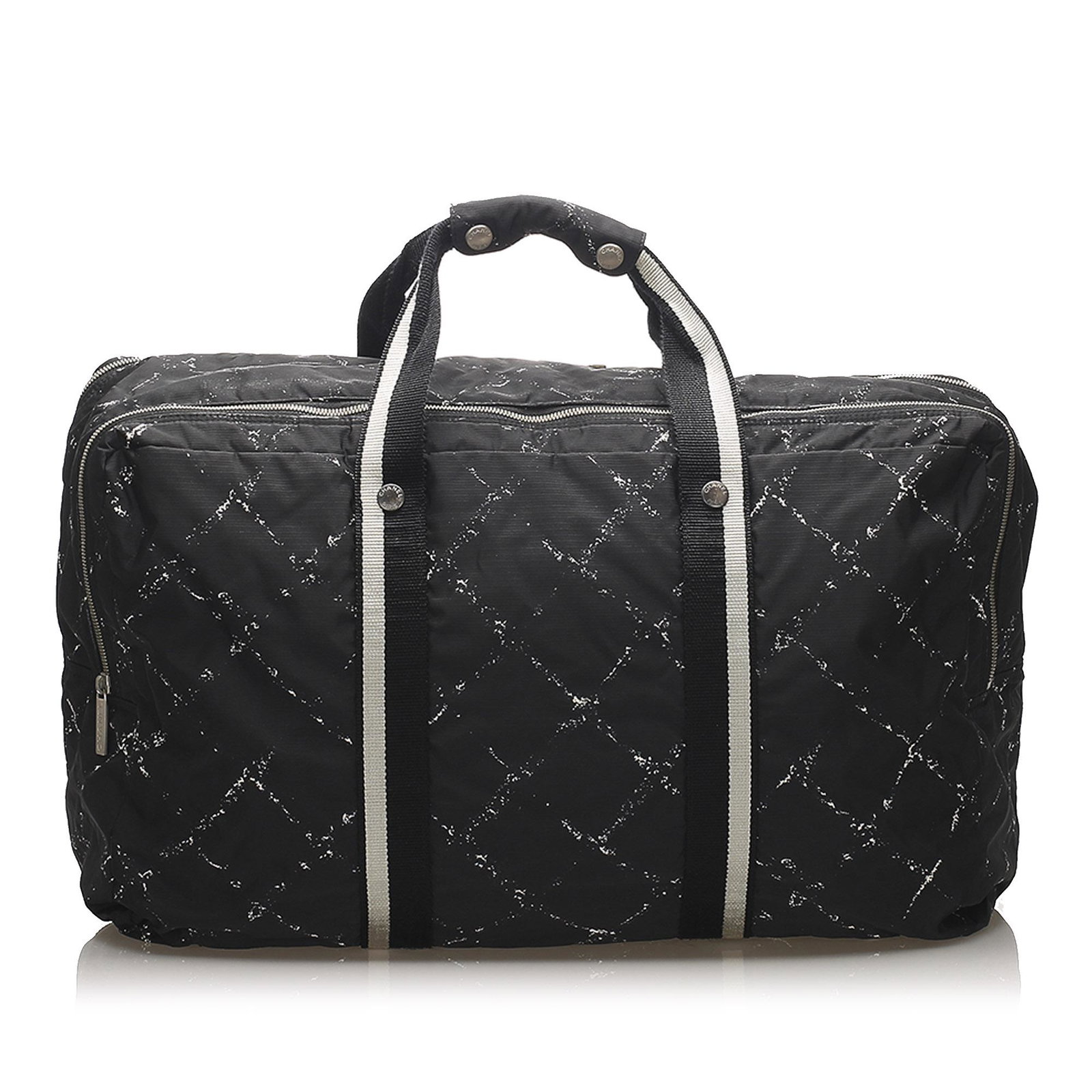 Authentic Chanel Old Travel Line Nylon Travel Bag: The Old Travel Line travel bag features a nylon body flat straps and a top zip closure. Brand: Chanel Model: Old Travel Line Nylon Travel Bag Origin: France Category: Bags Color: Black Style: Old Trav