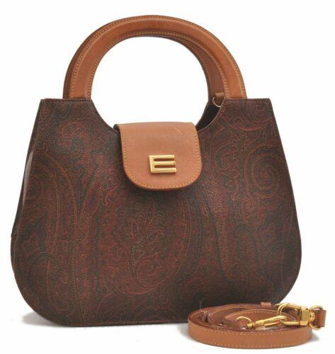 Authentic ETRO Hand Bag: Brand: ETRO Model: Hand Bag Country of Origin: Italy Material: PVC/Leather Color: Brown Bag Length: 11inches (28cm) Bag Height: 7.1inches (18cm) Bag Depth: 2.6inches (6.5cm) All Bidhaus items come wit