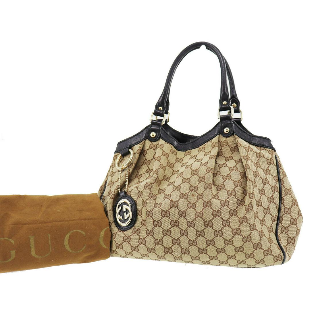 Authentic GUCCI Tote Bag: Brand: GUCCI Model: Tote Bag Country of Origin: Italy Material: Cotton Color: White Gold Bag Length: 13.3 Bag Height: 10.2 Bag Depth: 4.7 All Bidhaus items come with a 100 % money-back authenticity gu
