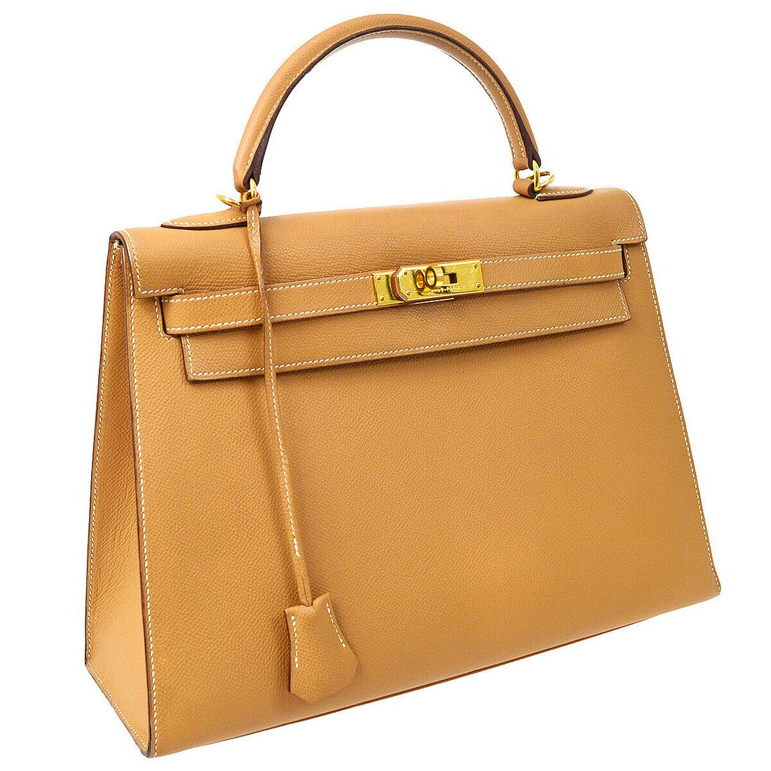 Authentic HERMES Kelly 32 Hand Bag: Brand: HERMES Model: Kelly 32 Hand Bag Country of Origin: France Material: Leather Color: Brown Size (Inch): W 13.0 x H 9.4 x D 4.7 "Handle Drop. 3.5 "Strap Drop. 17.3 " Size (CM): W 33.0 x H 24.0 x D