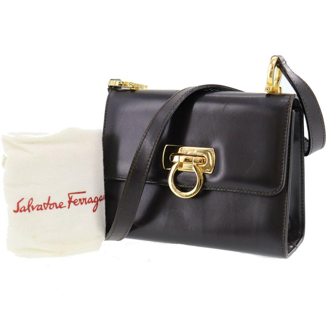 Authentic SALVATORE FERRAGAMO Shoulder Bag: Brand: SALVATORE FERRAGAMO Model: Shoulder Bag Country of Origin: Italy Material: Leather Color: Dark Brown Bag Length: 6.2 Bag Height: 4.9 Bag Depth: 2.7 All Bidhaus items come with a 100 % money-bac