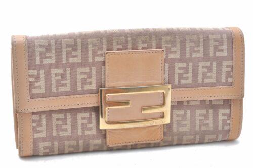 Authentic FENDI Wallet: Brand: FENDI Model: Wallet Country of Origin: Italy Material: Canvas Color: Beige Bag Length: 7.5inches(19cm) Bag Height: 3.7inches(9.5cm) Bag Depth: 1inches(2.5cm) All Bidhaus items come with a 100 %