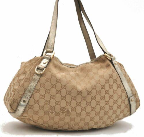Authentic GUCCI Tote Bag: Brand: GUCCI Model: Tote Bag Country of Origin: Italy Material: Canvas Color: Beige Bag Length: 16.1inches (41cm) Bag Height: 9.1inches (23cm) Bag Depth: 4.1inches (10.5cm) All Bidhaus items come with