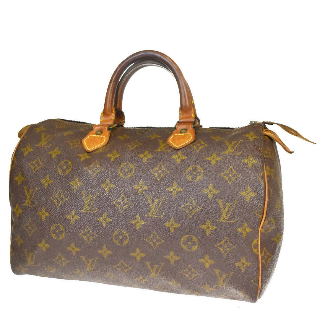 Authentic LOUIS VUITTON Hand Bag: Brand: LOUIS VUITTON Model: Hand Bag Country of Origin: France Material: Monogram Leather Color: Brown Size (Inch): W 11.8 X H 8.3 X D 6.7 "Size (CM): W 30 X H 21 X D 17 Cm All Bidhaus items come with