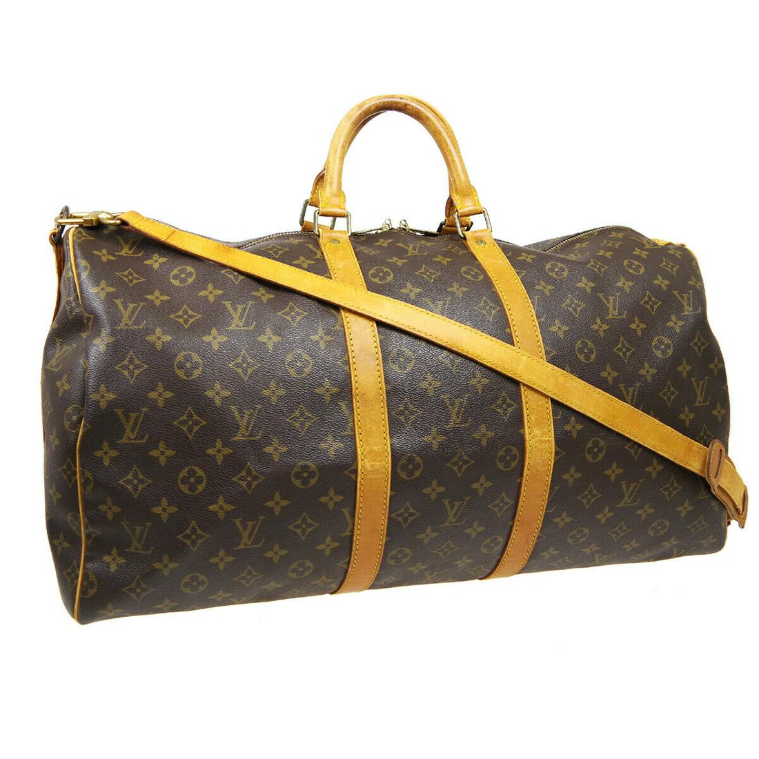 Authentic LOUIS VUITTON Keepall Bandouliere 55 Travel: Brand: LOUIS VUITTON Model: Keepall Bandouliere 55 Travel Hand Bag Country of Origin: France Material: Canvas Color: Brown Size (Inch): W 22.0 x H 11.8 x D 9.8 "Handle Drop. 4.3 "Strap Drop. 19.7 - 23